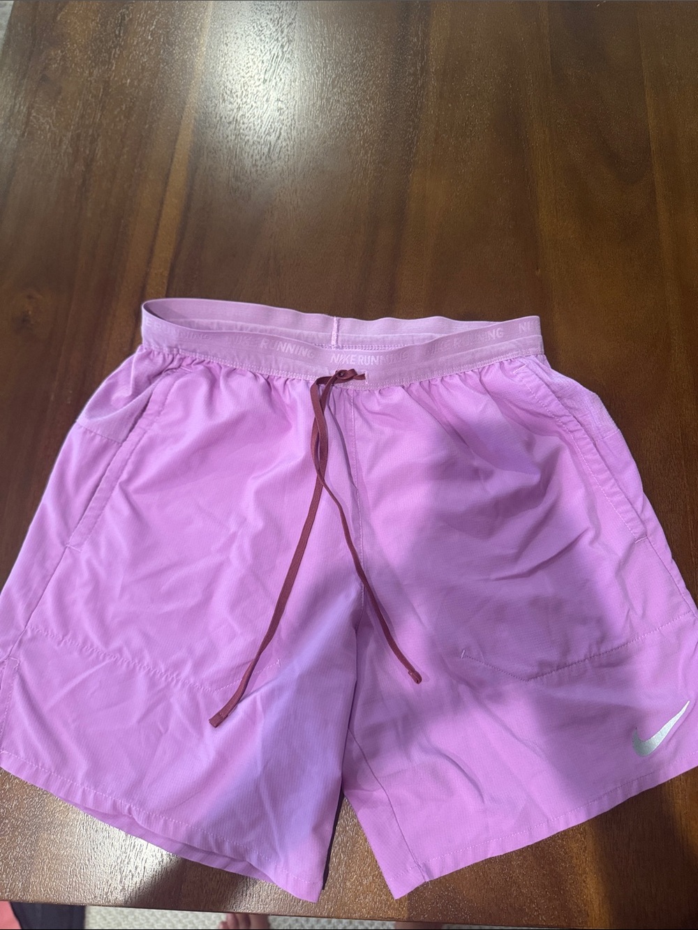 Nike men’s Light Pink Athletic Running Shorts with Contrast Drawstring